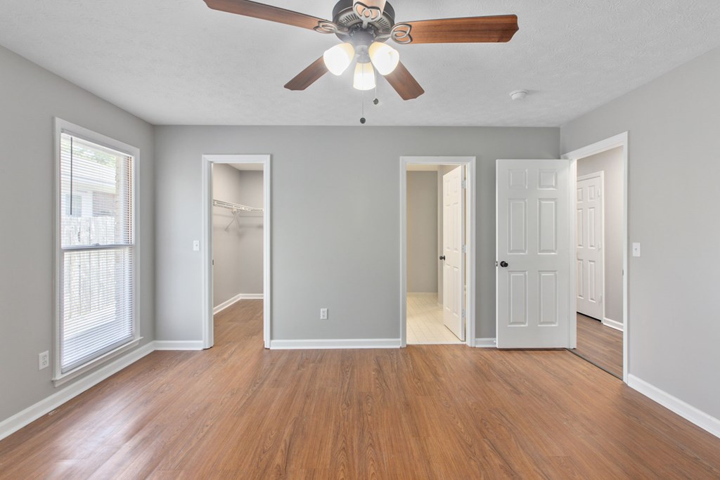 3613 Maryland Circle, Unit A Columbus, GA 31907 - Photo 26 of 28 wooden floor in an empty room with a window