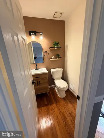a bathroom with a toilet and a sink