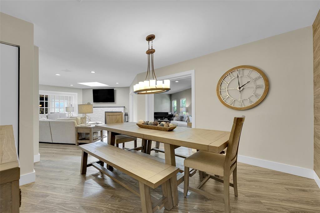 5351 Godfrey Road Parkland, FL 33067 - Photo 14 of 100 a view of a dining room with furniture window and wooden floor