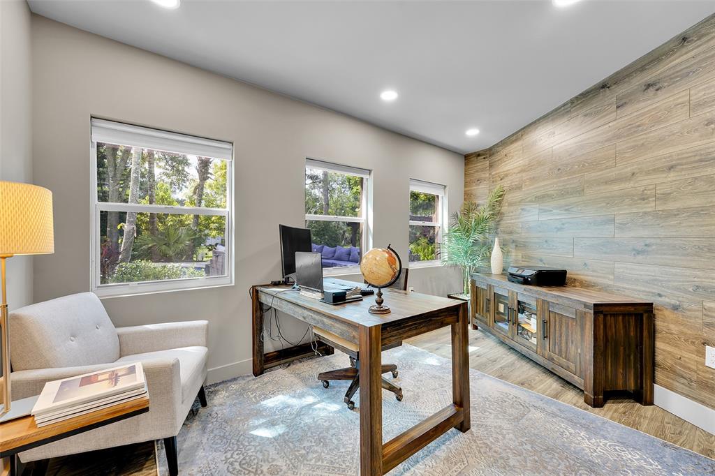 5351 Godfrey Road Parkland, FL 33067 - Photo 27 of 100 a living room with furniture a window and a fireplace