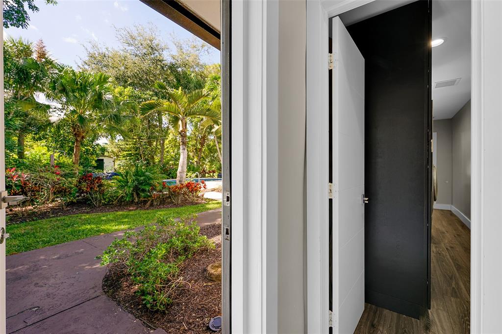5351 Godfrey Road Parkland, FL 33067 - Photo 30 of 100 a view of a yard from a corridor