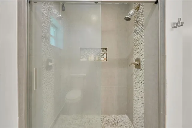 swimming pool view with a garden space