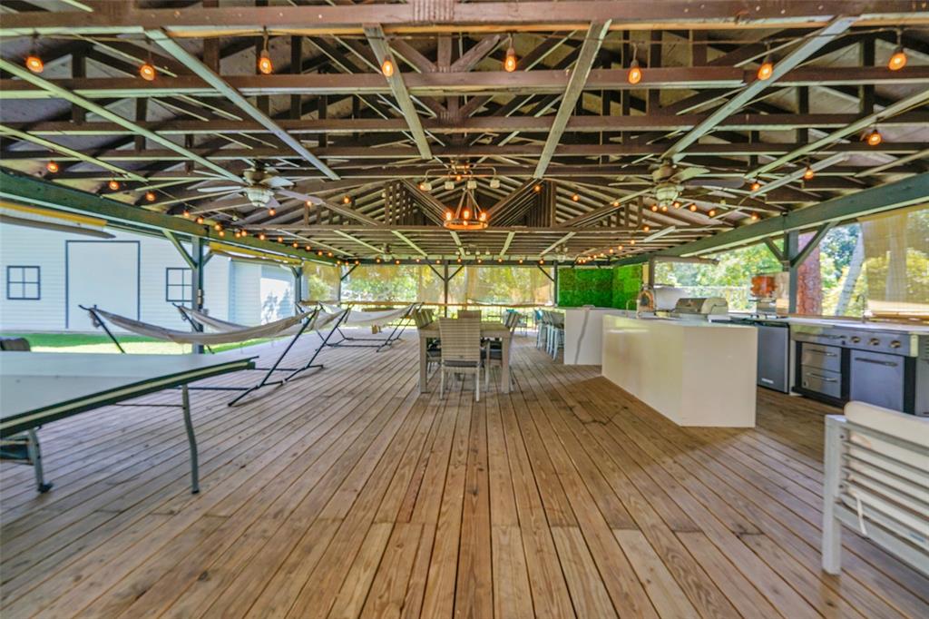 5351 Godfrey Road Parkland, FL 33067 - Photo 83 of 100 a view of a chairs and table on the wooden floor