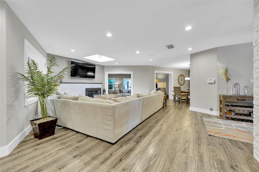 5351 Godfrey Road Parkland, FL 33067 - Photo 9 of 100 a living room with furniture and a flat screen tv