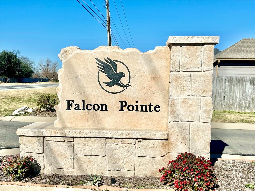 10445 Condor Loop Waco, TX 76708 - Photo 21 of 22 a sign broad on the side of a building