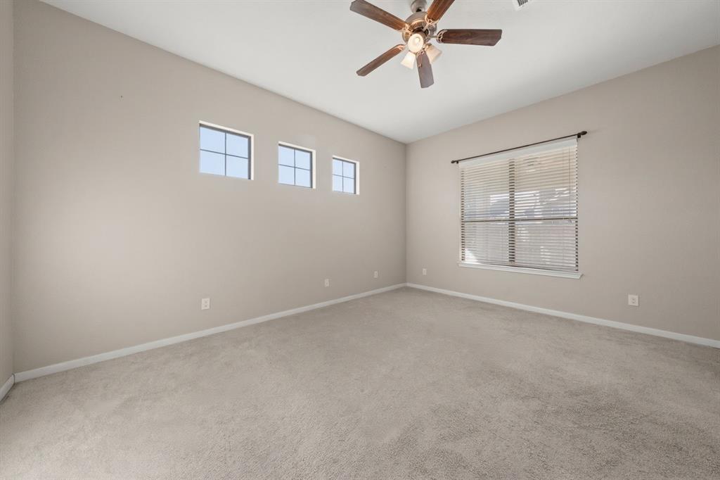 10445 Condor Loop Waco, TX 76708 - Photo 10 of 22 a view of an empty room with a window