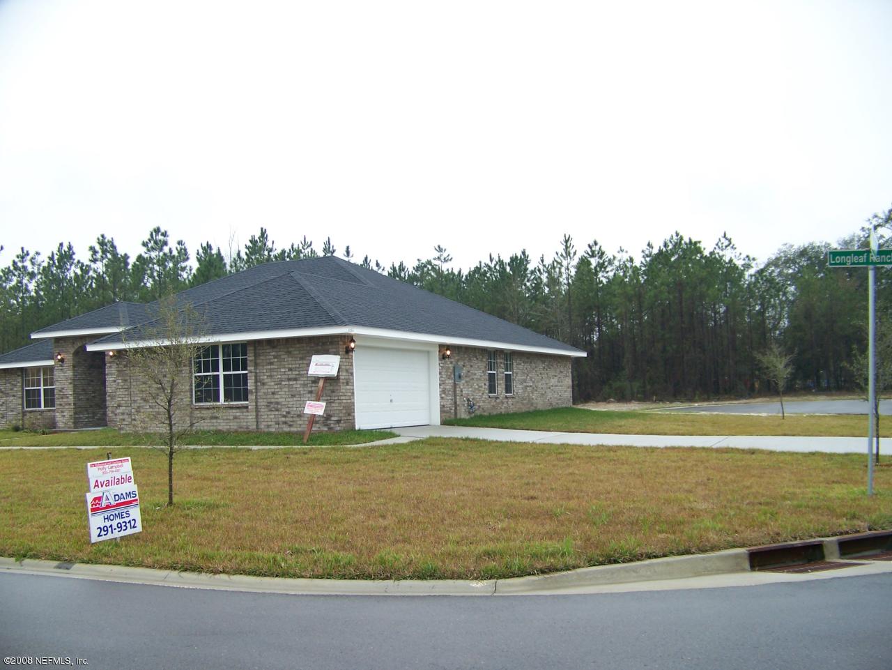 3056 Longleaf Ranch Circle Middleburg, FL 32068 - Photo 2 of 8 side of home on cul-de-sac