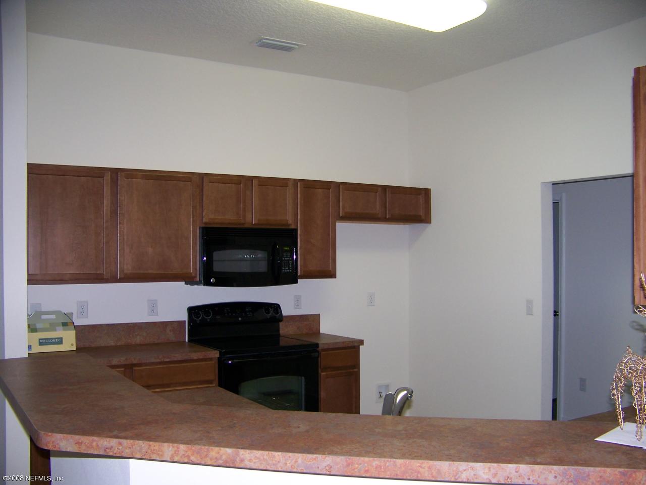 3056 Longleaf Ranch Circle Middleburg, FL 32068 - Photo 3 of 8 kitchen with upgraded appliances