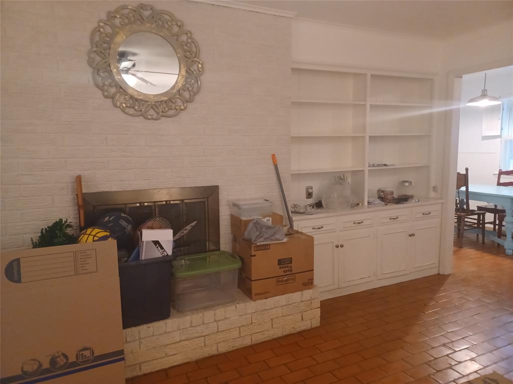 415 Magnolia Street Denton, TX 76201 - Photo 13 of 23 a room with storage and utility