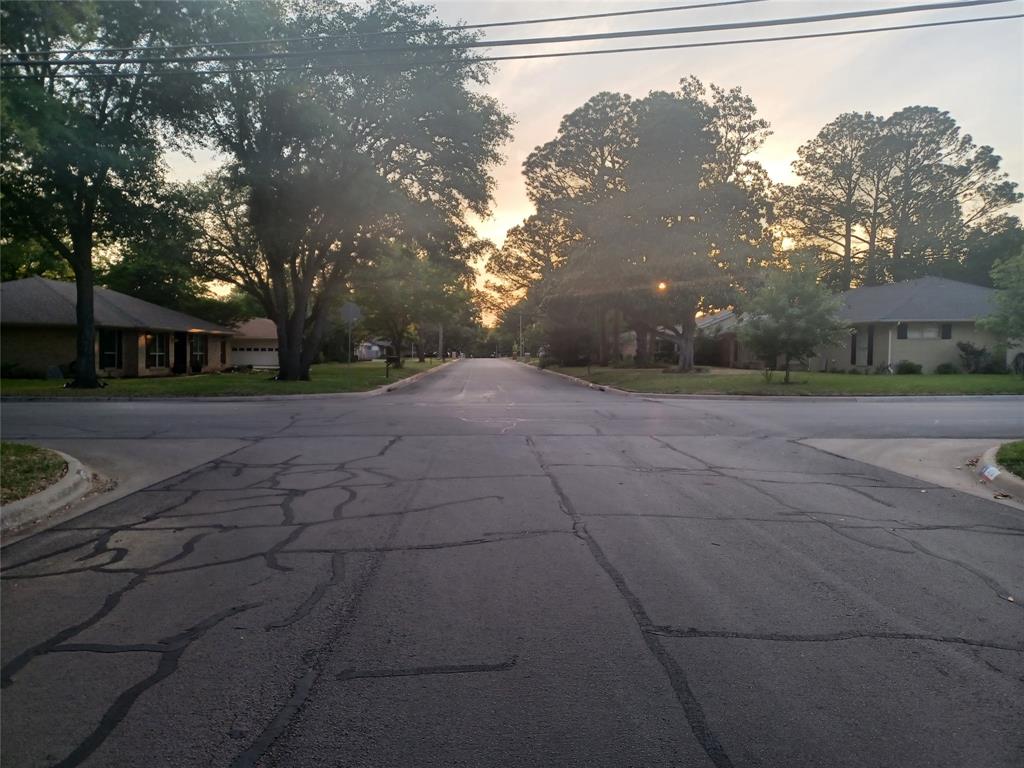 415 Magnolia Street Denton, TX 76201 - Photo 2 of 23 a view of a backyard of the house