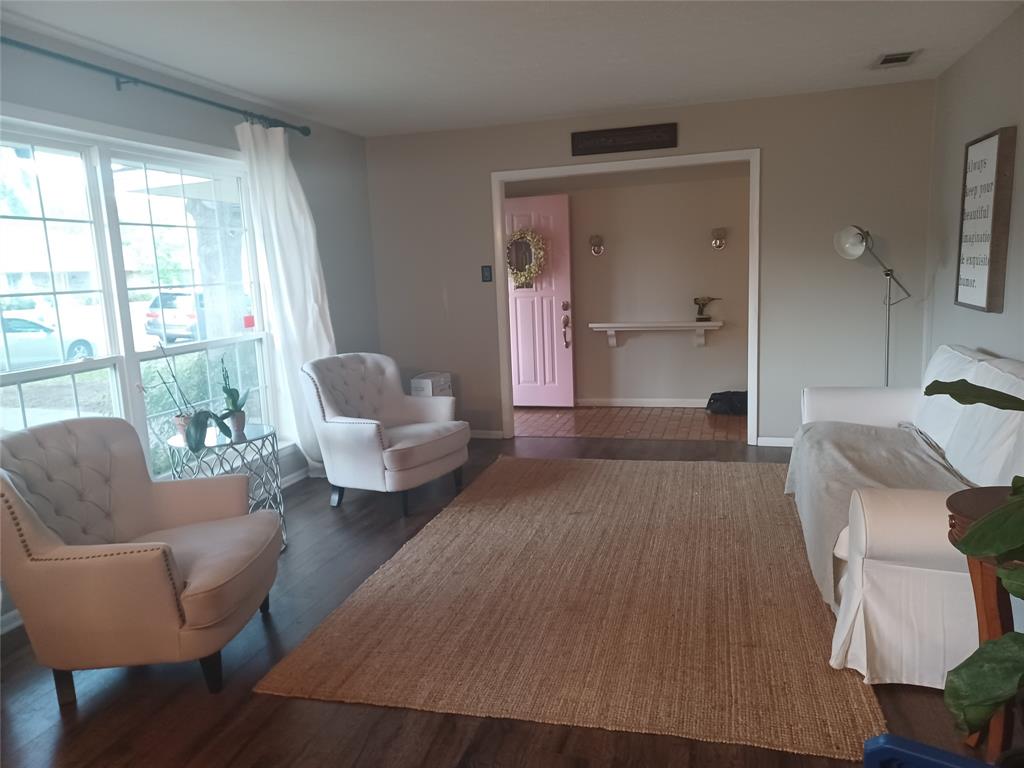 415 Magnolia Street Denton, TX 76201 - Photo 4 of 23 a living room with furniture and a large window