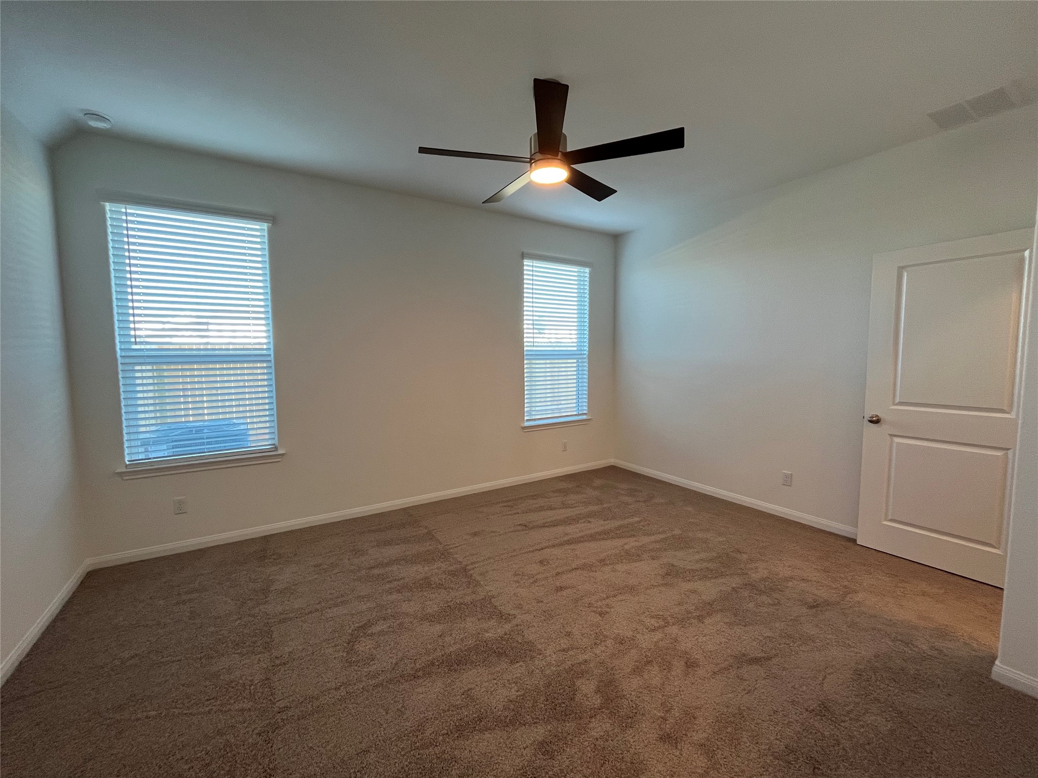 8522 Wellspring Loop Round Rock, TX 78665 - Photo 14 of 37 Master bedroom on primary. For demonstration purposes only. This will be the same interior layout. Colors can vary.