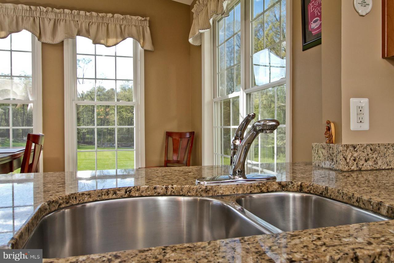 6532 Ford Road Frederick, MD 21702 - Photo 11 of 30 Kitchen opens to sunroom