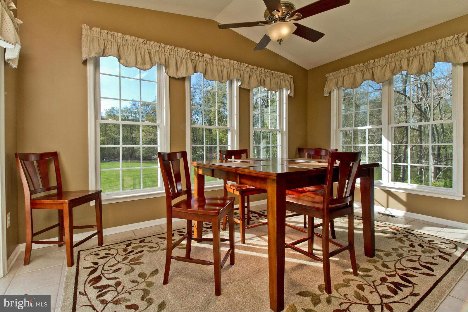 6532 Ford Road Frederick, MD 21702 - Photo 12 of 30 This sunroom off kitchen is light and bright