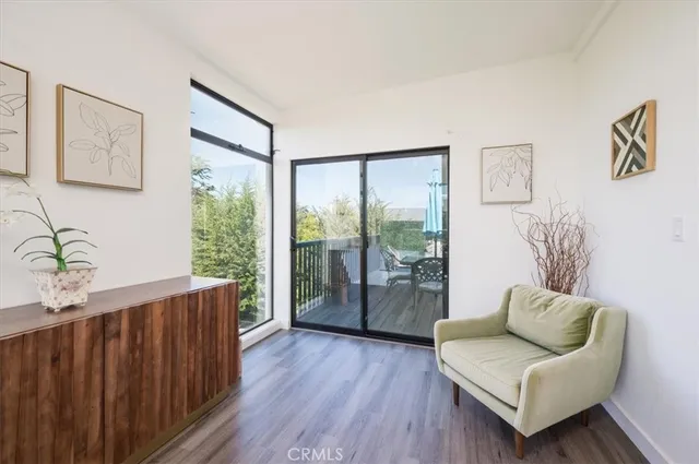 a bedroom with bed and flat screen tv