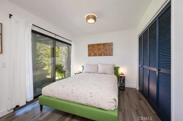 a view of washer and dryer with kitchen in the background