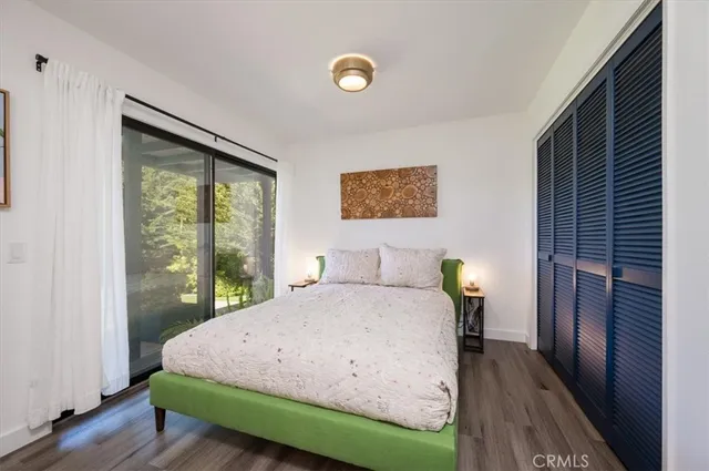 a view of washer and dryer with kitchen in the background