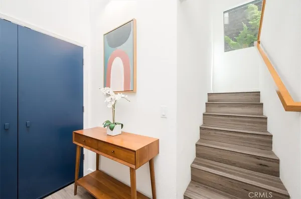 a view of a balcony with wooden floor