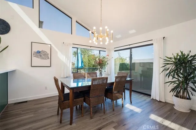 a kitchen with kitchen island stainless steel appliances a sink and stove