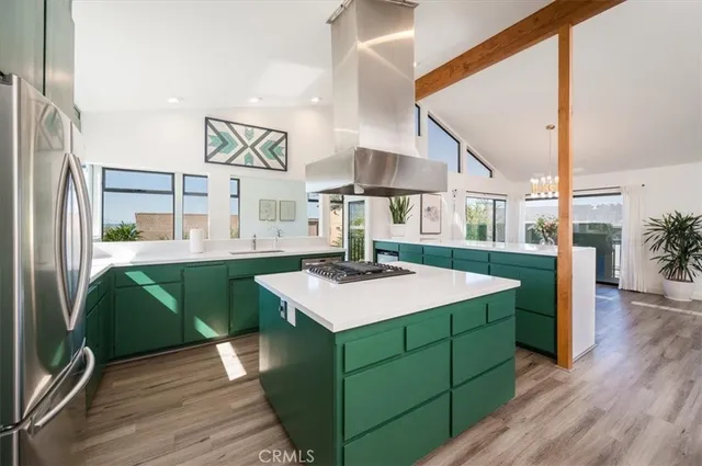 a kitchen with a sink and a large window