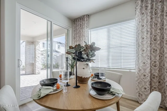 a kitchen with stainless steel appliances granite countertop a stove and a white cabinets