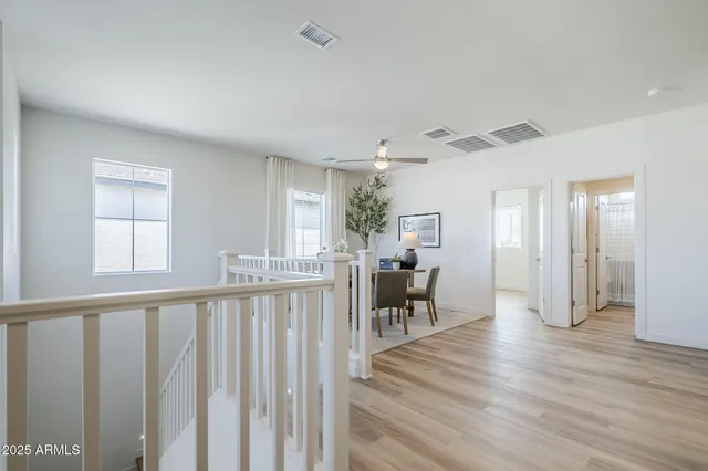 a view of a living room and dining room