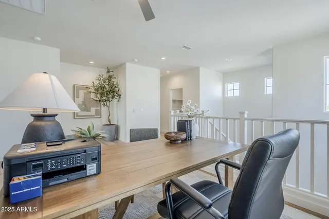 a bathroom with a double vanity sink toilet and shower