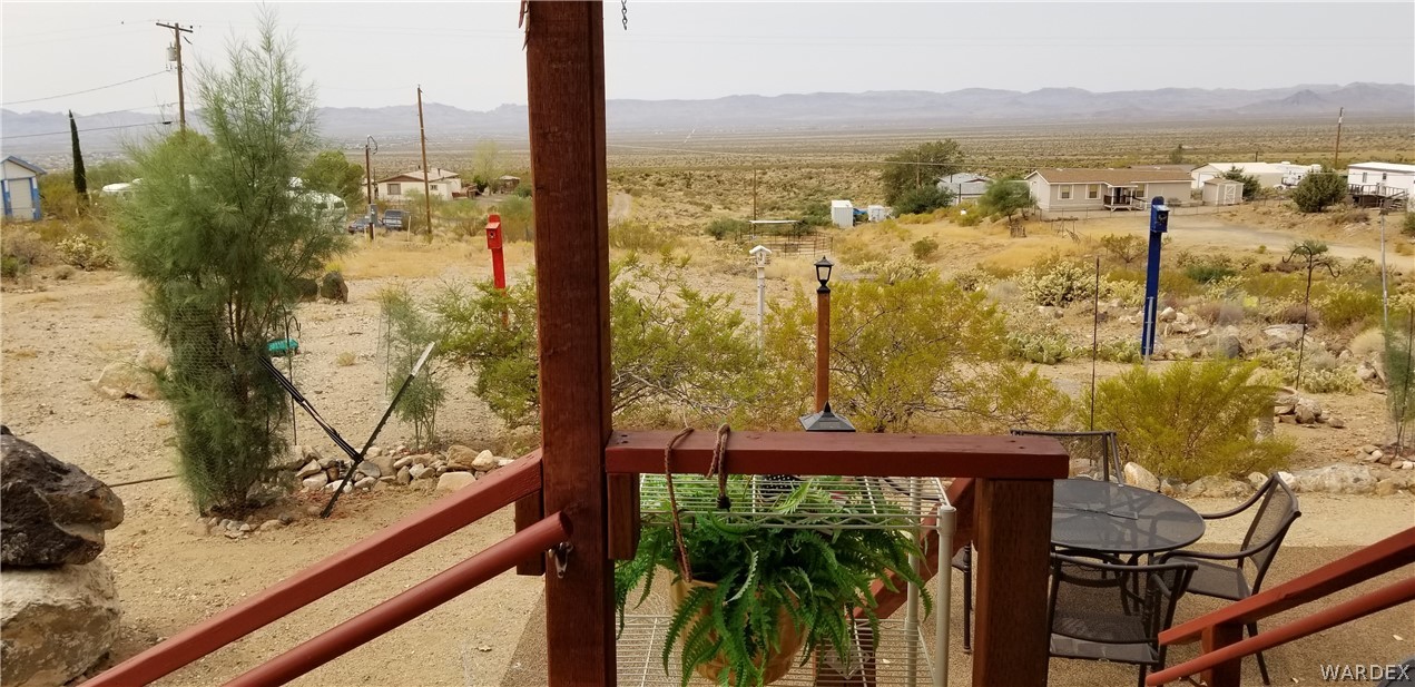 4550 Smoketree Road Golden Valley, AZ 86413 - Photo 18 of 38 a view of a lake from a balcony