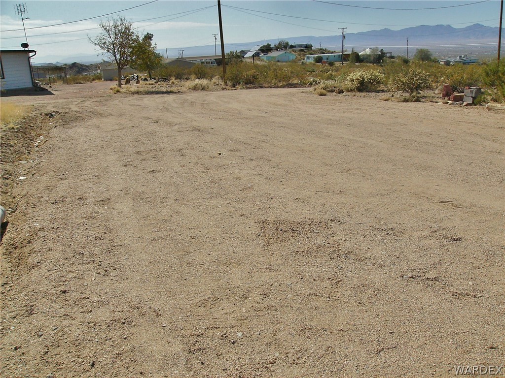 4550 Smoketree Road Golden Valley, AZ 86413 - Photo 25 of 38 a view of a beach with a yard