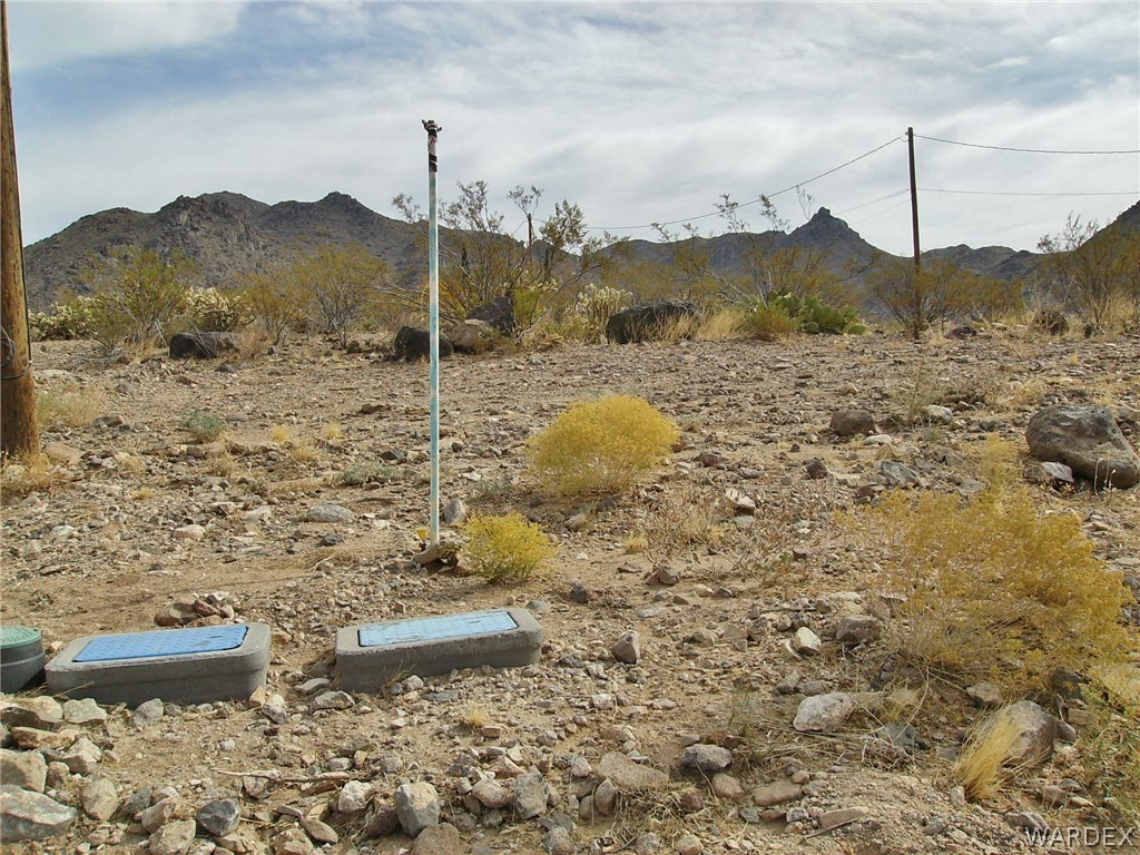 4550 Smoketree Road Golden Valley, AZ 86413 - Photo 29 of 38 a view of a lake with a mountain