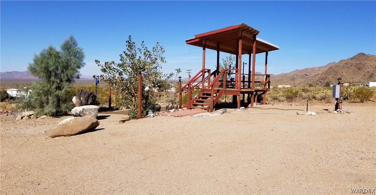 4550 Smoketree Road Golden Valley, AZ 86413 - Photo 5 of 38 a view of a park with a slide