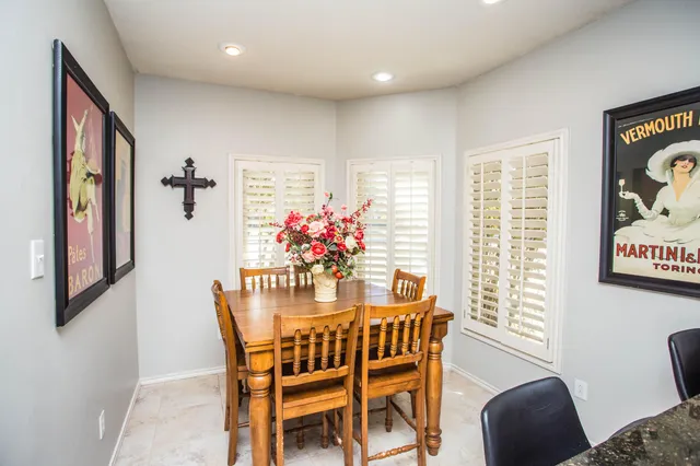 wooden floor with white walls and a window