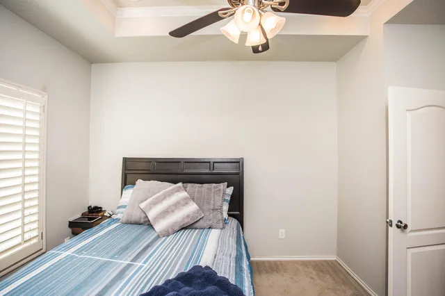 a room with furniture and a flat screen tv