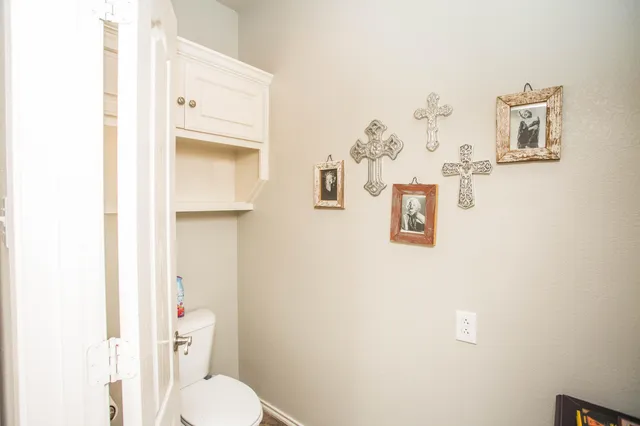 a en suite bathroom with a sink double vanity and a mirror