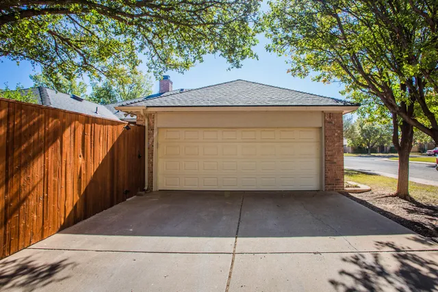 a view of a dining room with furniture and a rug