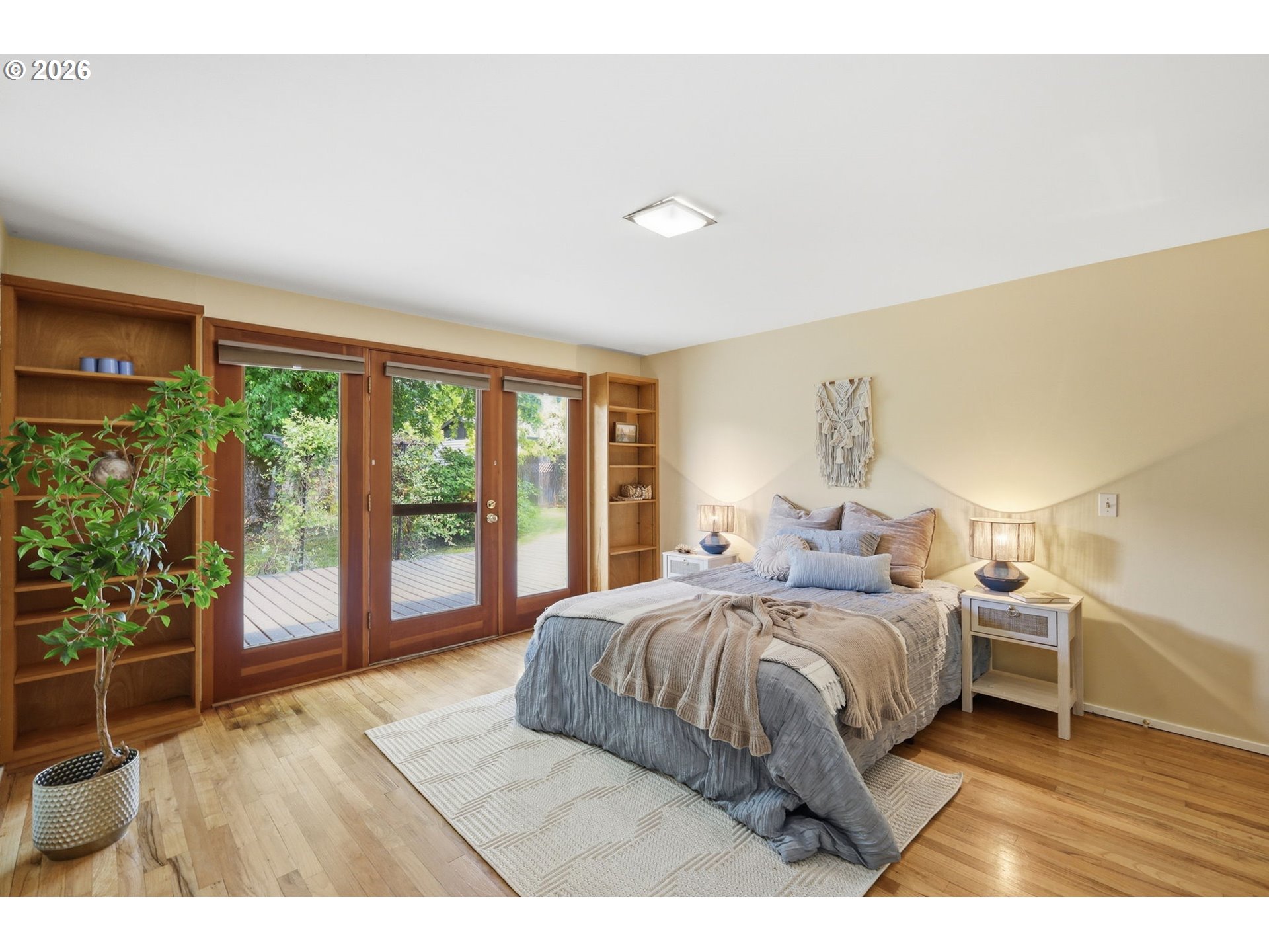 3025 Harris Street Eugene, OR 97405 - Photo 30 of 44 a bedroom with a large bed and a large window