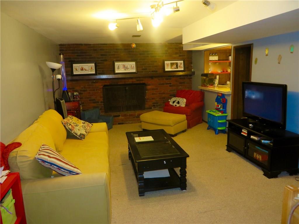 181 Seegar Road Upper St. Clair, PA 15241 - Photo 4 of 25 Remodeled game room, lower level, with walk out exit to back yard