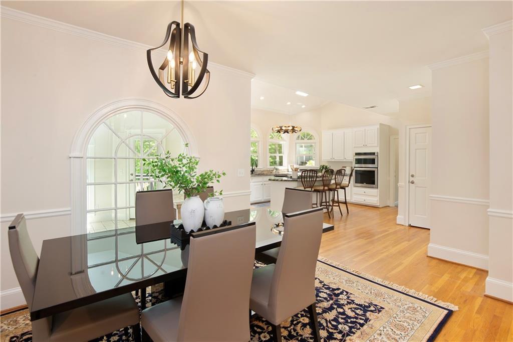 2935 Coles Way Atlanta, GA 30350 - Photo 13 of 56 a living room with furniture a window and a chandelier