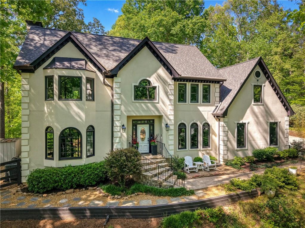 2935 Coles Way Atlanta, GA 30350 - Photo 2 of 56 a front view of a house with a yard