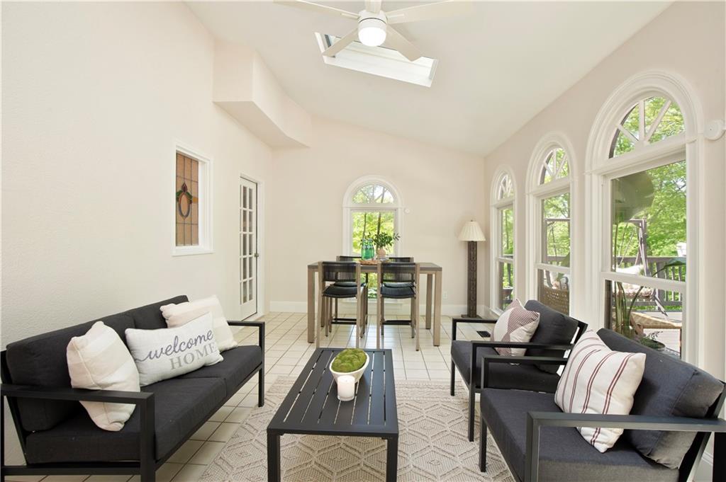 2935 Coles Way Atlanta, GA 30350 - Photo 21 of 56 a living room with furniture and a large window