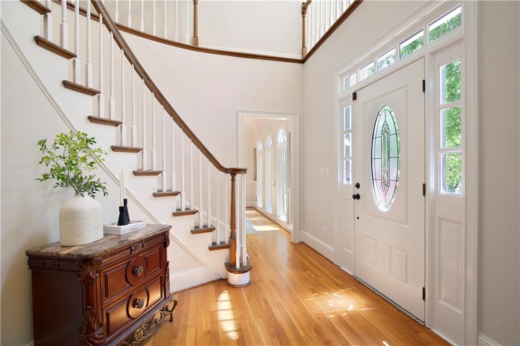 2935 Coles Way Atlanta, GA 30350 - Photo 3 of 56 a view of an entryway with wooden floor and stairs