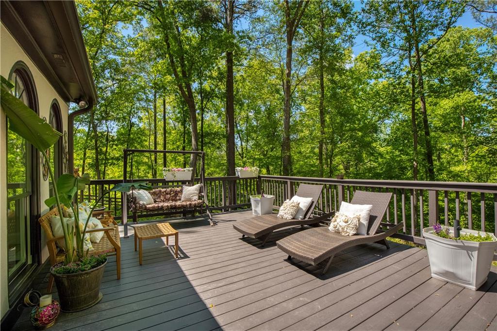 2935 Coles Way Atlanta, GA 30350 - Photo 40 of 56 a balcony with wooden floor and outdoor seating