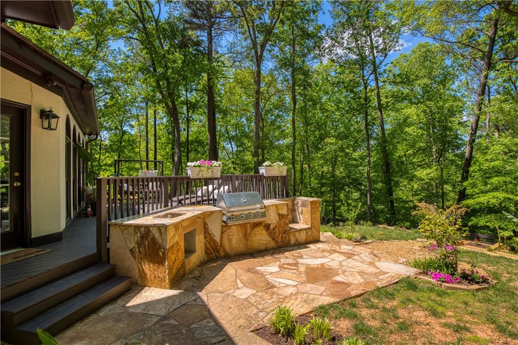 2935 Coles Way Atlanta, GA 30350 - Photo 42 of 56 a view of balcony with wooden floor and outdoor seating