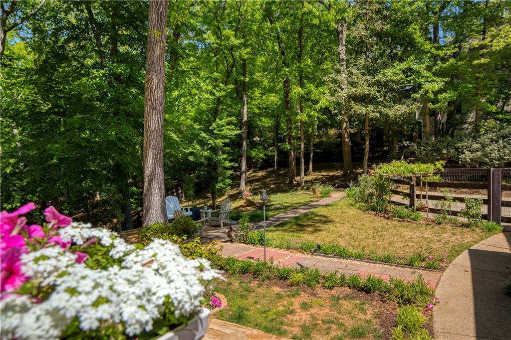 2935 Coles Way Atlanta, GA 30350 - Photo 44 of 56 a view of a backyard with flowers