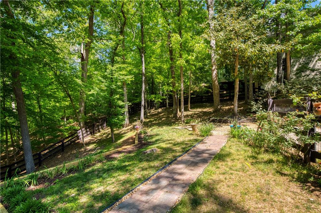 2935 Coles Way Atlanta, GA 30350 - Photo 47 of 56 a backyard of a house with table and chairs