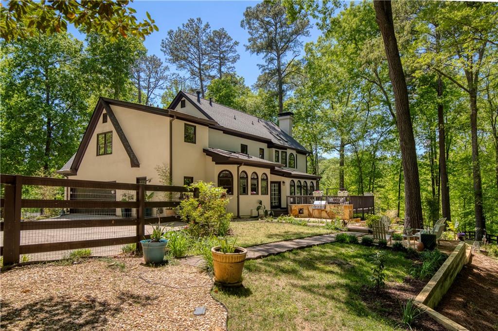 2935 Coles Way Atlanta, GA 30350 - Photo 48 of 56 a front view of a house with garden