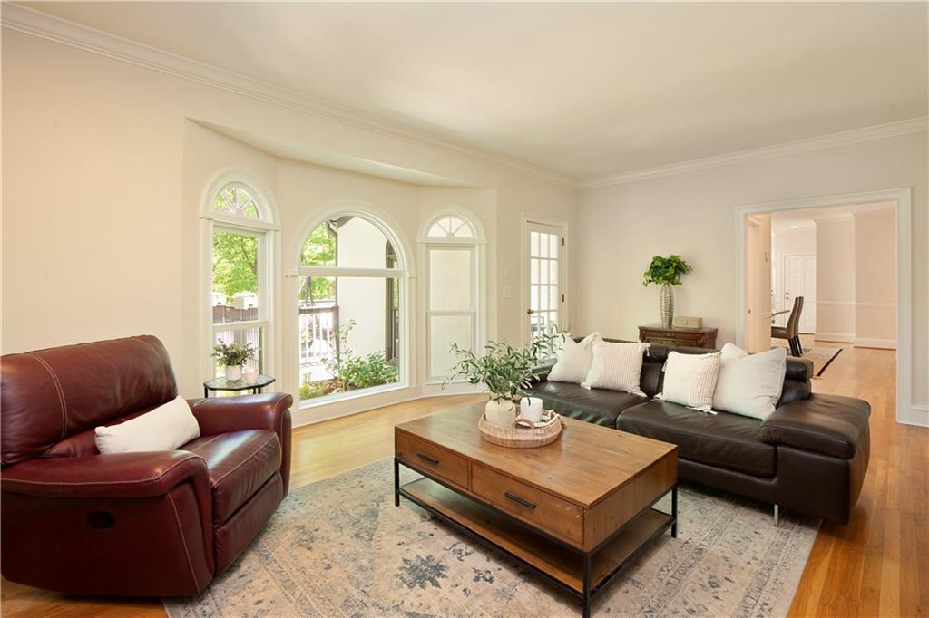 2935 Coles Way Atlanta, GA 30350 - Photo 8 of 56 a living room with furniture and a large window