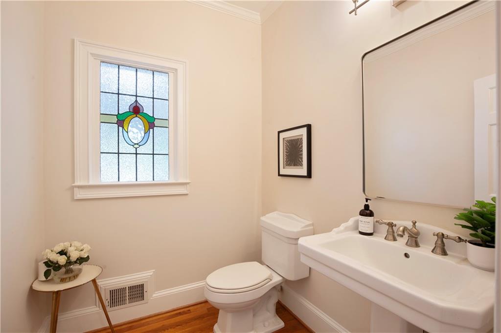 2935 Coles Way Atlanta, GA 30350 - Photo 9 of 56 a bathroom with a sink mirror and toilet