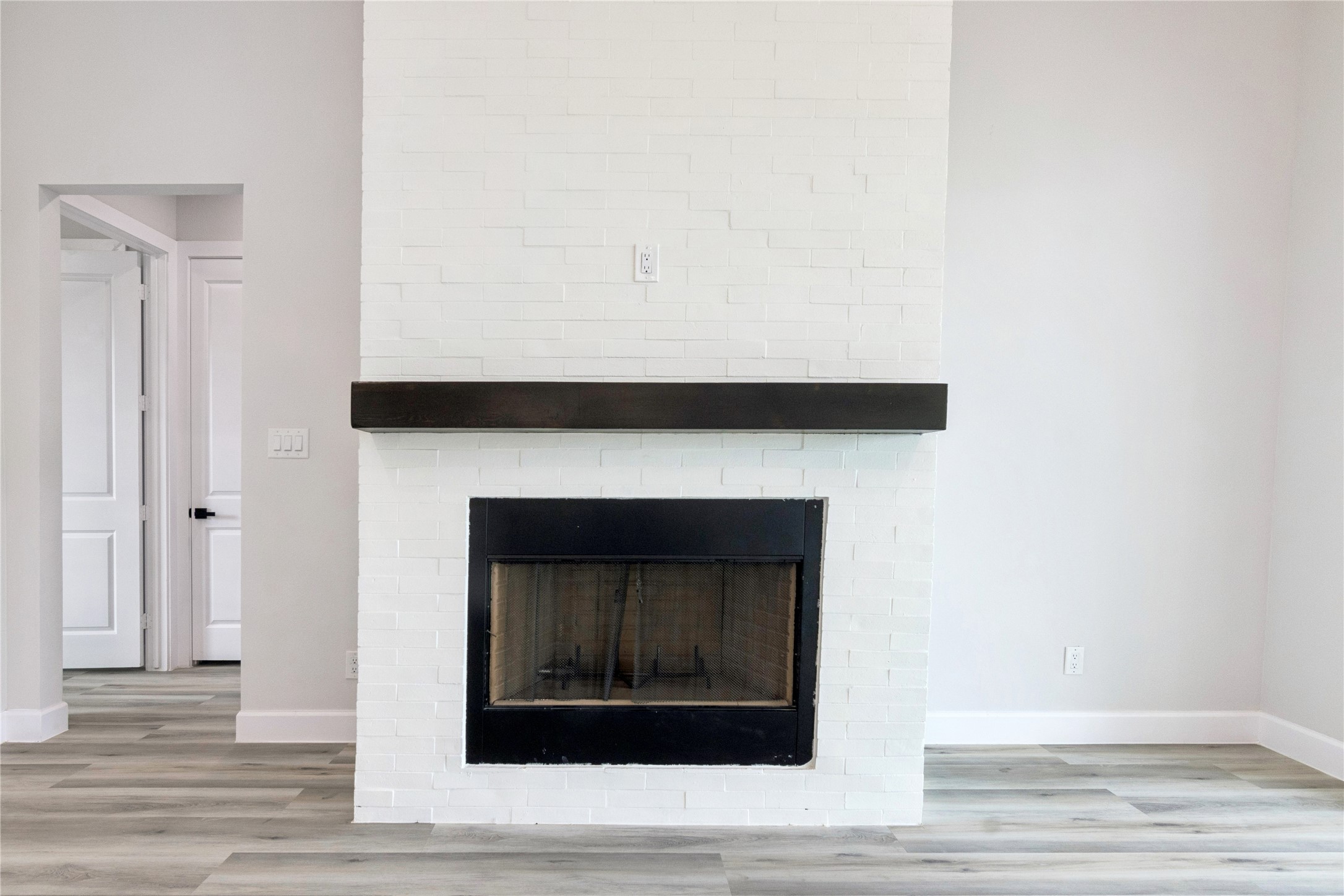 5766 Ward Bend Road Sealy, TX 77474 - Photo 11 of 45 a living room with a fireplace
