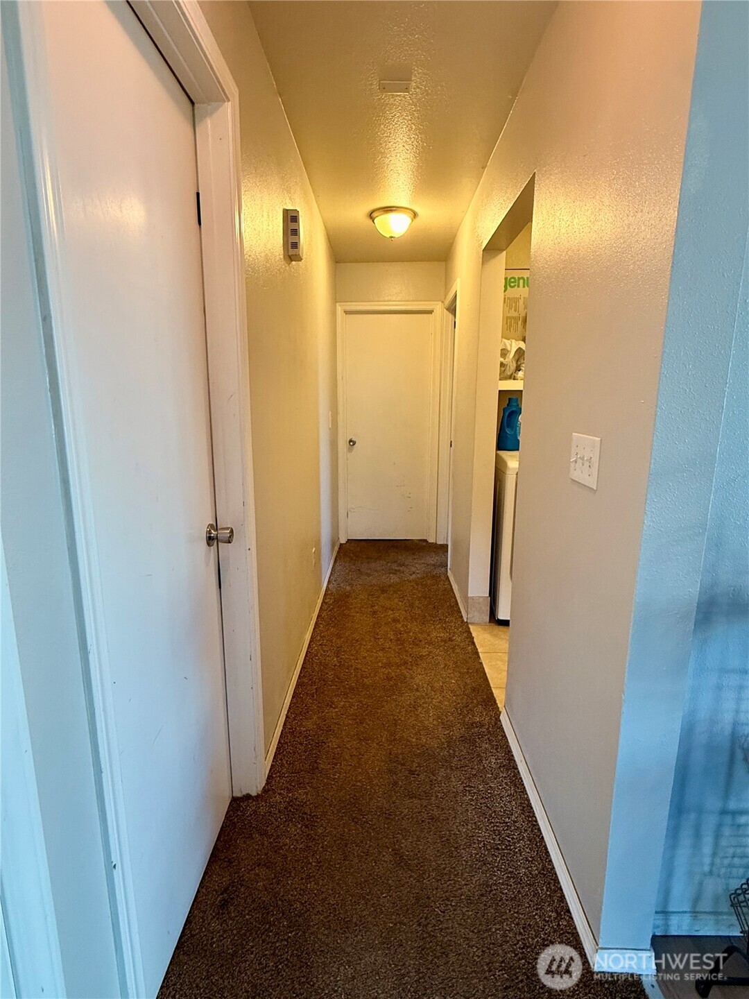 812 Ferry Street Wenatchee, WA 98801 - Photo 18 of 29 a view of a hallway with wooden floor